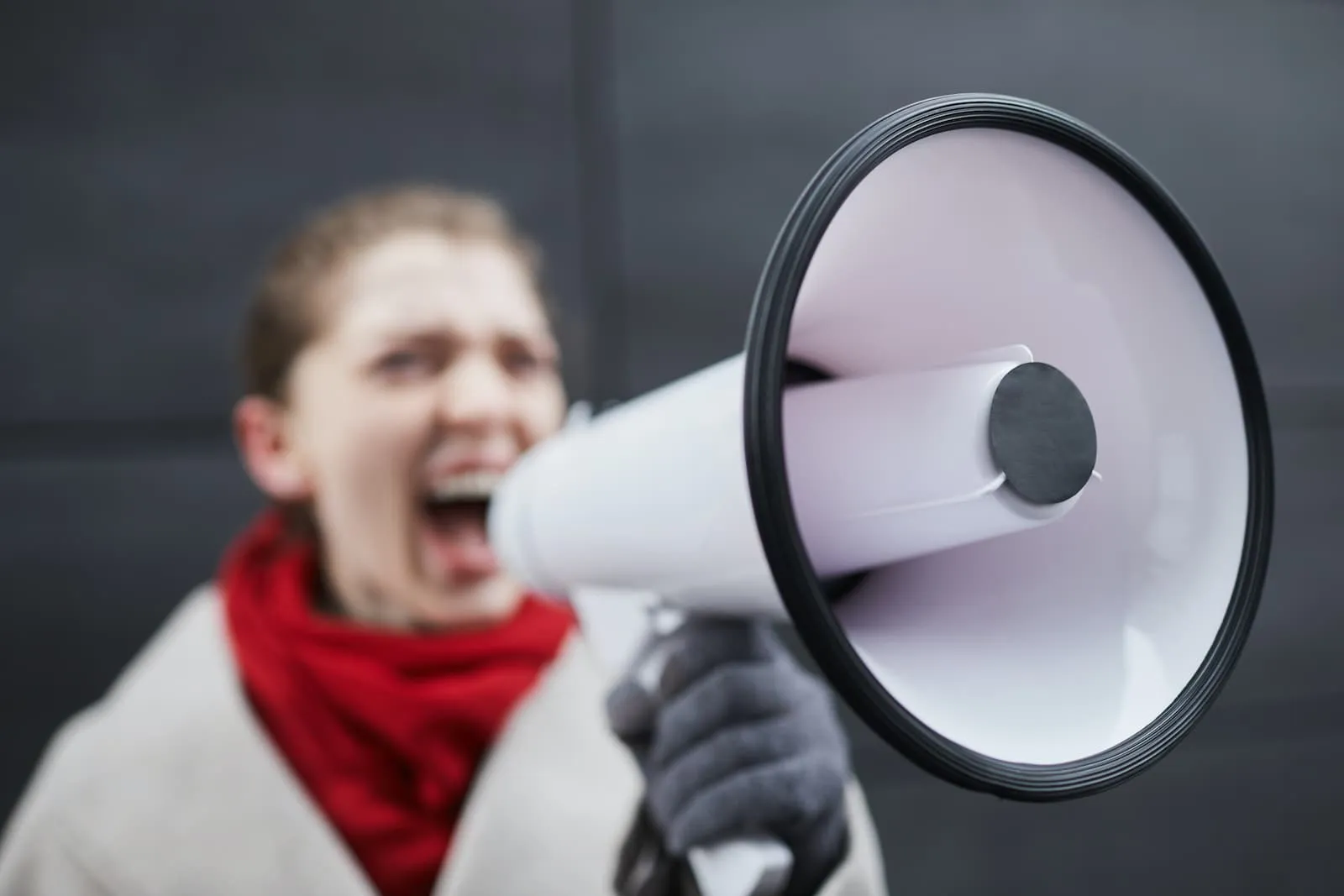 Woman Speaking into a Megaphone.