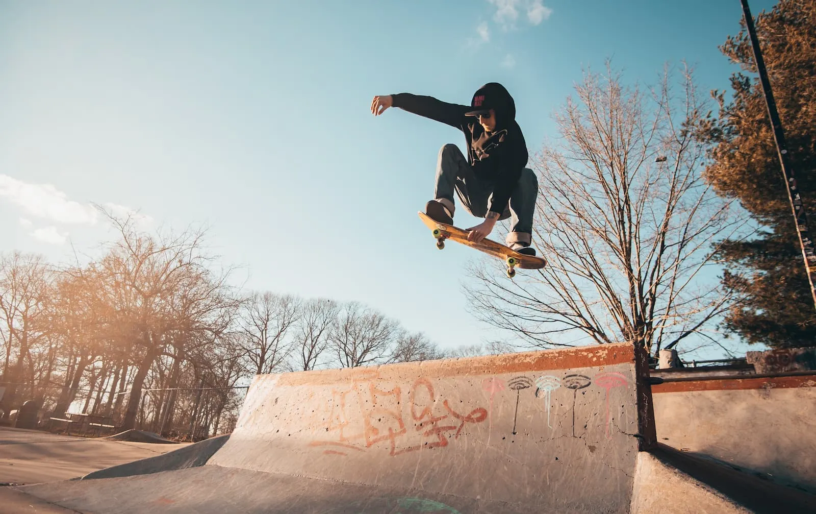 A skateboarder in mid air jump, like a menu panel popping up.