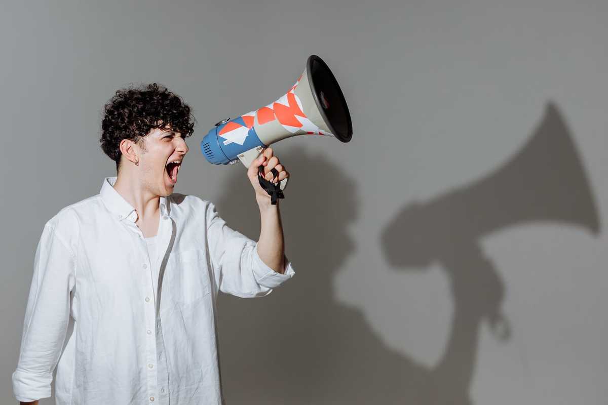 Man speaking into a megaphone